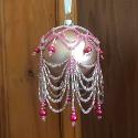 Pink and white beaded bauble cover.