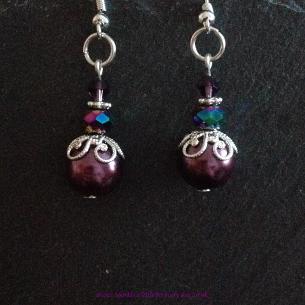 Purple crackle drop earrings.