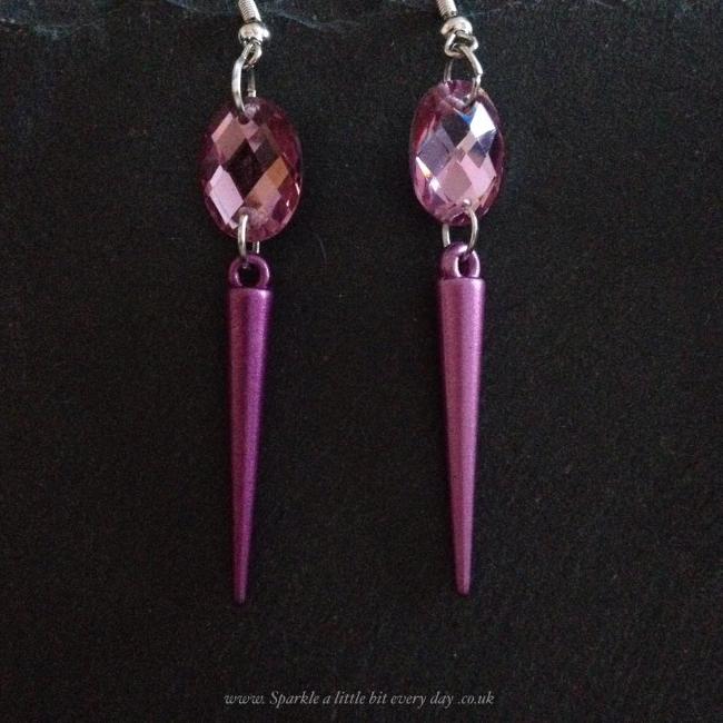 Pink spike earrings.