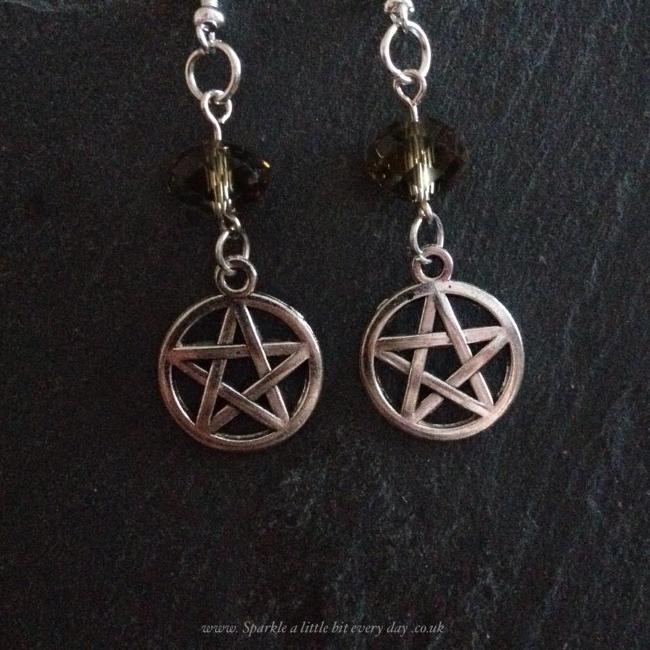 Pentagram earrings.