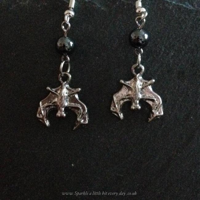 Sleeping bat earrings.