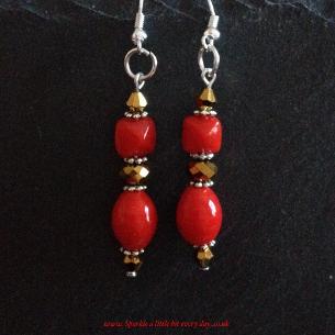 Red and gold drop earrings.