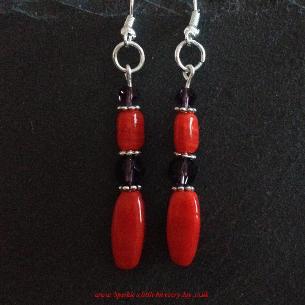 Red drop earrings.