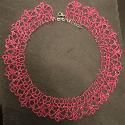 Bright pink lace necklace.