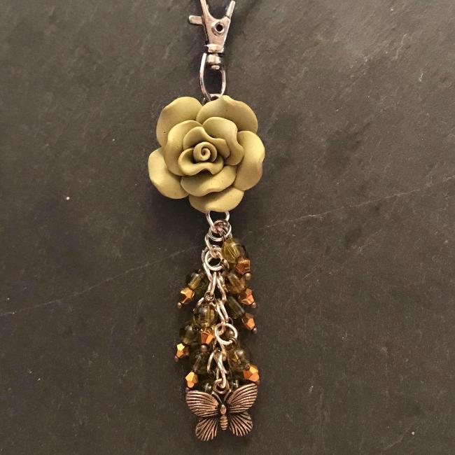 This fun bag charm can clip easily onto your bag, your coat, or anywhere you like.