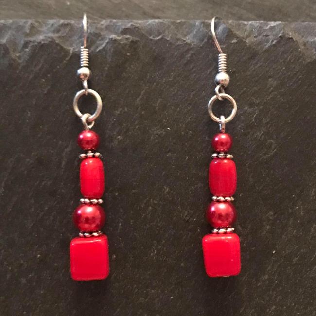 Red earrings made from glass beads and crystals.