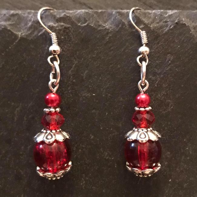 Red earrings made from glass beads and crystals.