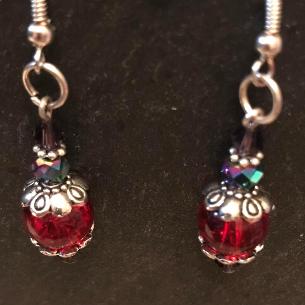Red drop earrings.