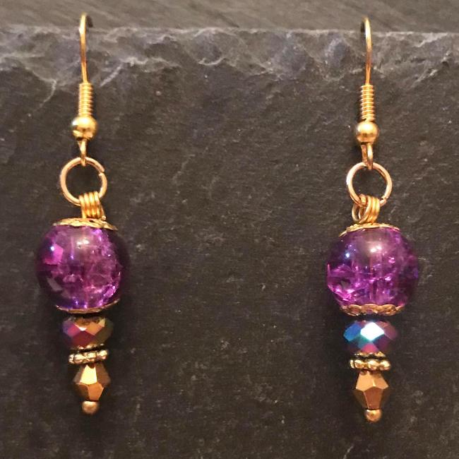 Purple earrings made from glass beads and crystals.