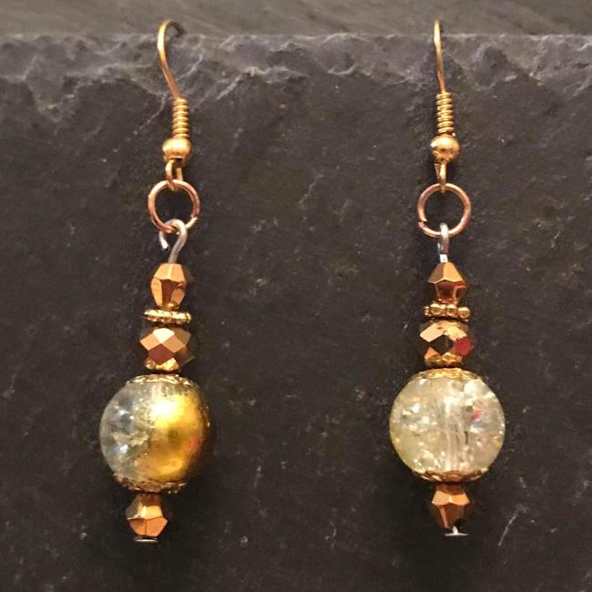 Gold earrings made from glass beads and crystals.