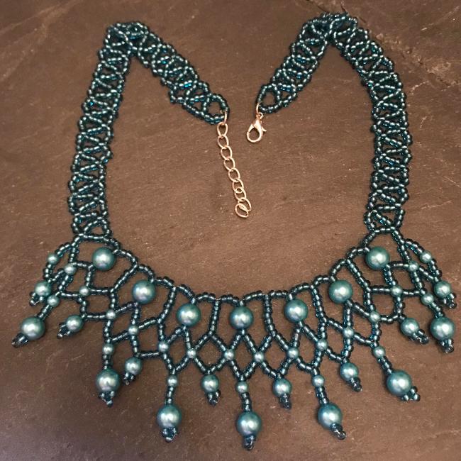 Turquoise pearl necklace.