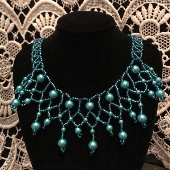 Turquoise pearl necklace.