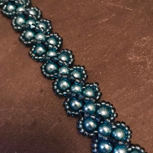 Turquoise pearl bracelet.