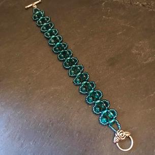 Turquoise glass bracelet.