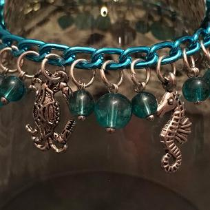 Turquoise charm bracelet.