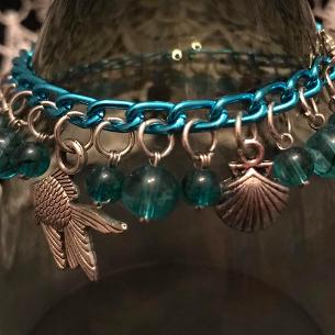 Turquoise charm bracelet.