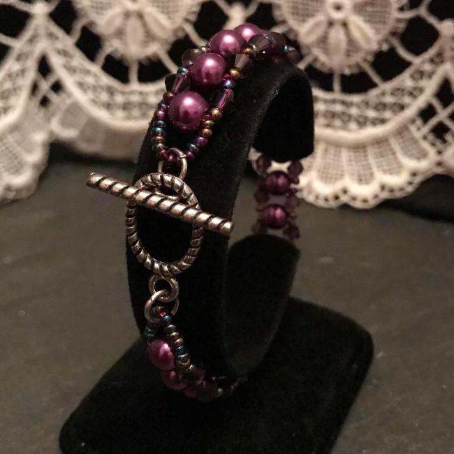 Purple pearl bracelet.