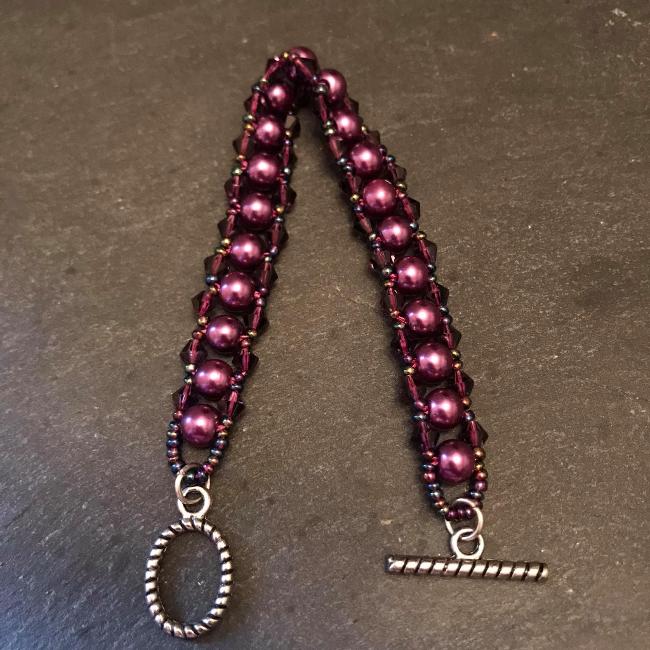 Purple pearl bracelet.