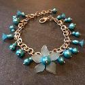 turquoise flower and pearl bracelet.
