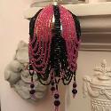 Bright pink and black beaded bauble cover.