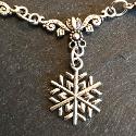 Snowflake necklace.