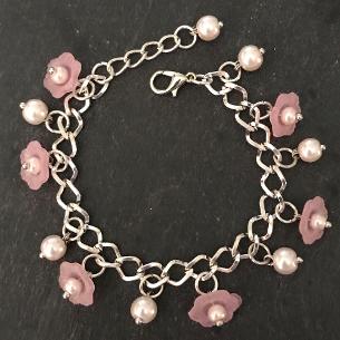 Pink flowers and pearls child's bracelet.