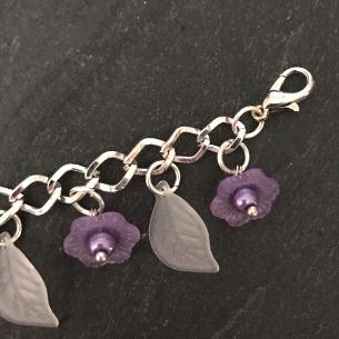 Purple flowers bracelet.