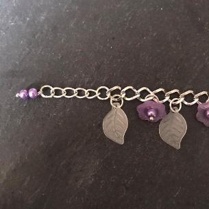 Purple flowers child's bracelet.