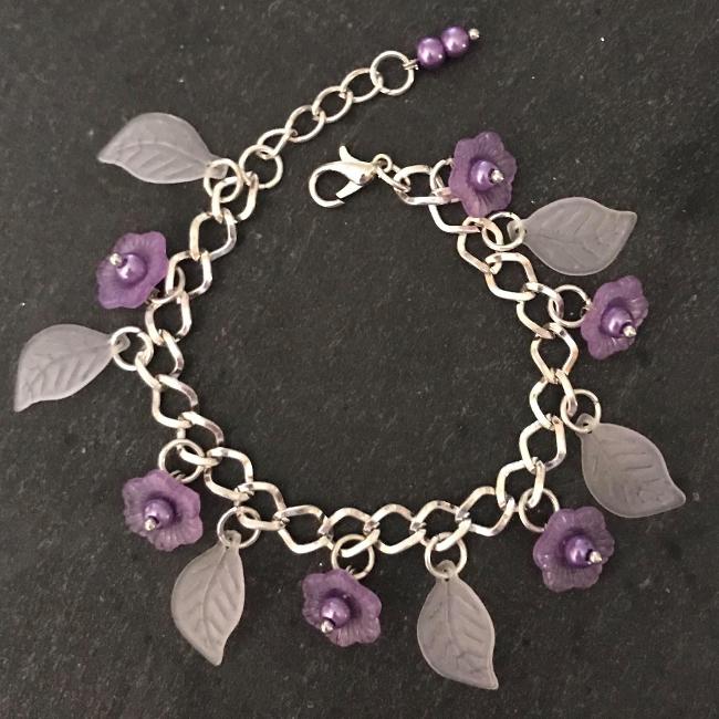 Purple flowers child's bracelet.