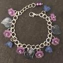 Purple and blue flowers child's bracelet.