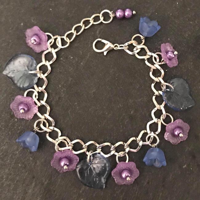 Purple and blue flowers child's bracelet.