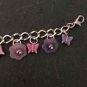 Close up of the clasp on this child's bracelet.