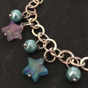 Close up view of stars on the bracelet..