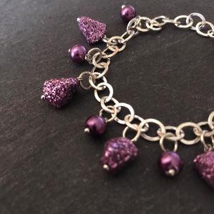 Close up view of purple glitter bracelet..