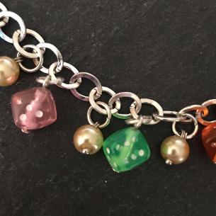 Close up view of dice on the bracelet..