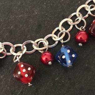Close up view of dice on the bracelet..
