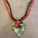 Red and black leaf necklace.