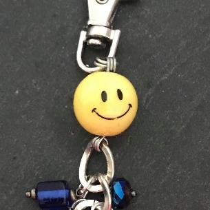 Close up view of a feature of the bag charm.