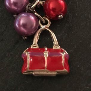 Close up view of a feature of the bag charm.