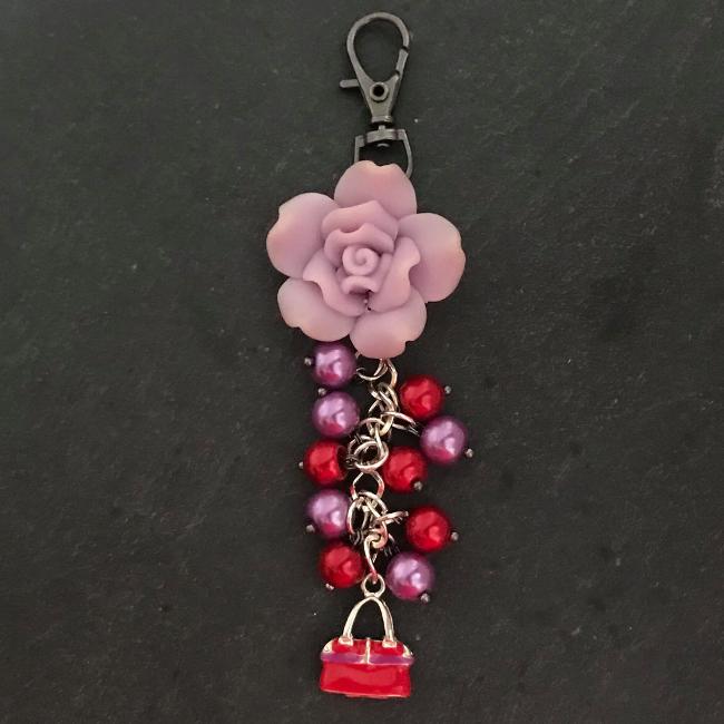 This fun bag charm can clip easily onto your bag, your coat, or anywhere you like. 