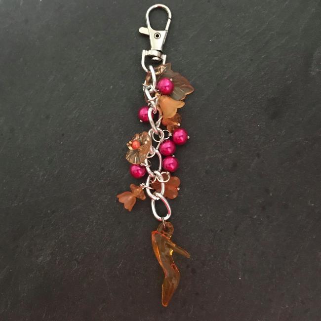 This fun bag charm can clip easily onto your bag, your coat, or anywhere you like.