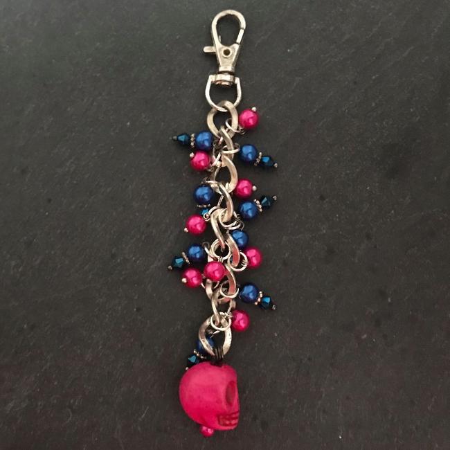 This fun bag charm can clip easily onto your bag, your coat, or anywhere you like. 