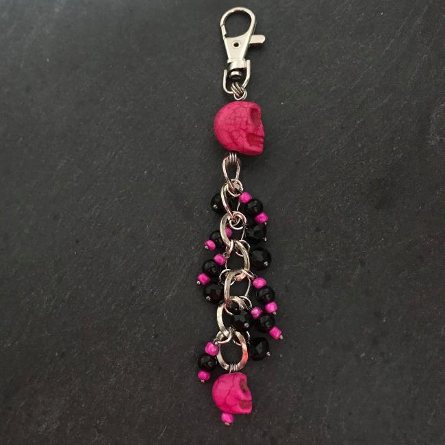 This fun bag charm can clip easily onto your bag, your coat, or anywhere you like.