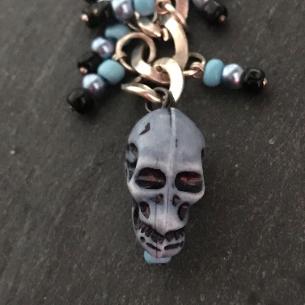 Close up view of a feature of the bag charm.