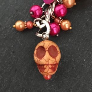 Close up view of a feature of the bag charm.