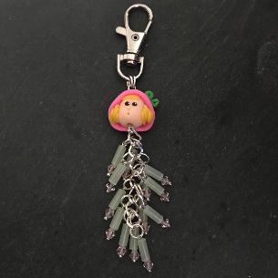 Jane with pink crystals bag charm.