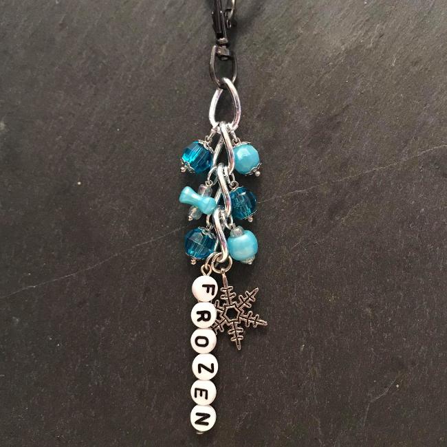 This fun bag charm can clip easily onto your bag, your coat, or anywhere you like.